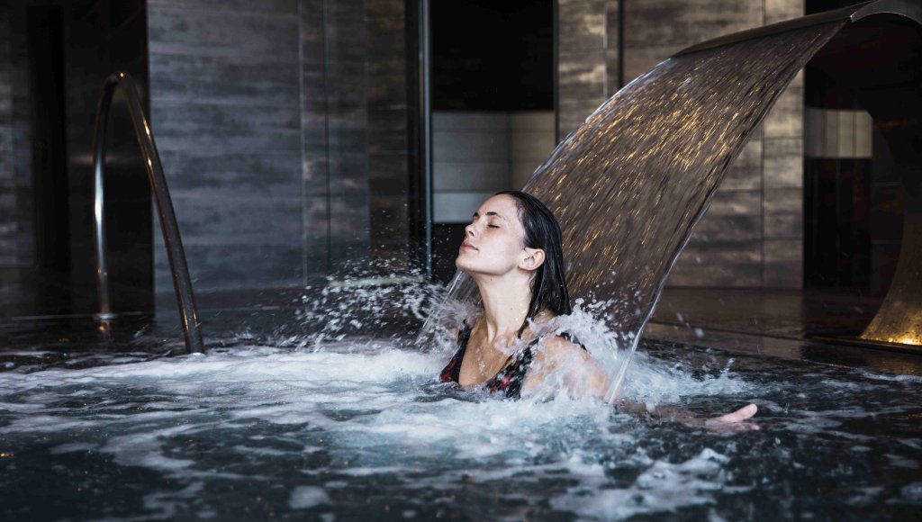 spa-concept-with-woman-relaxing-water2.jpg